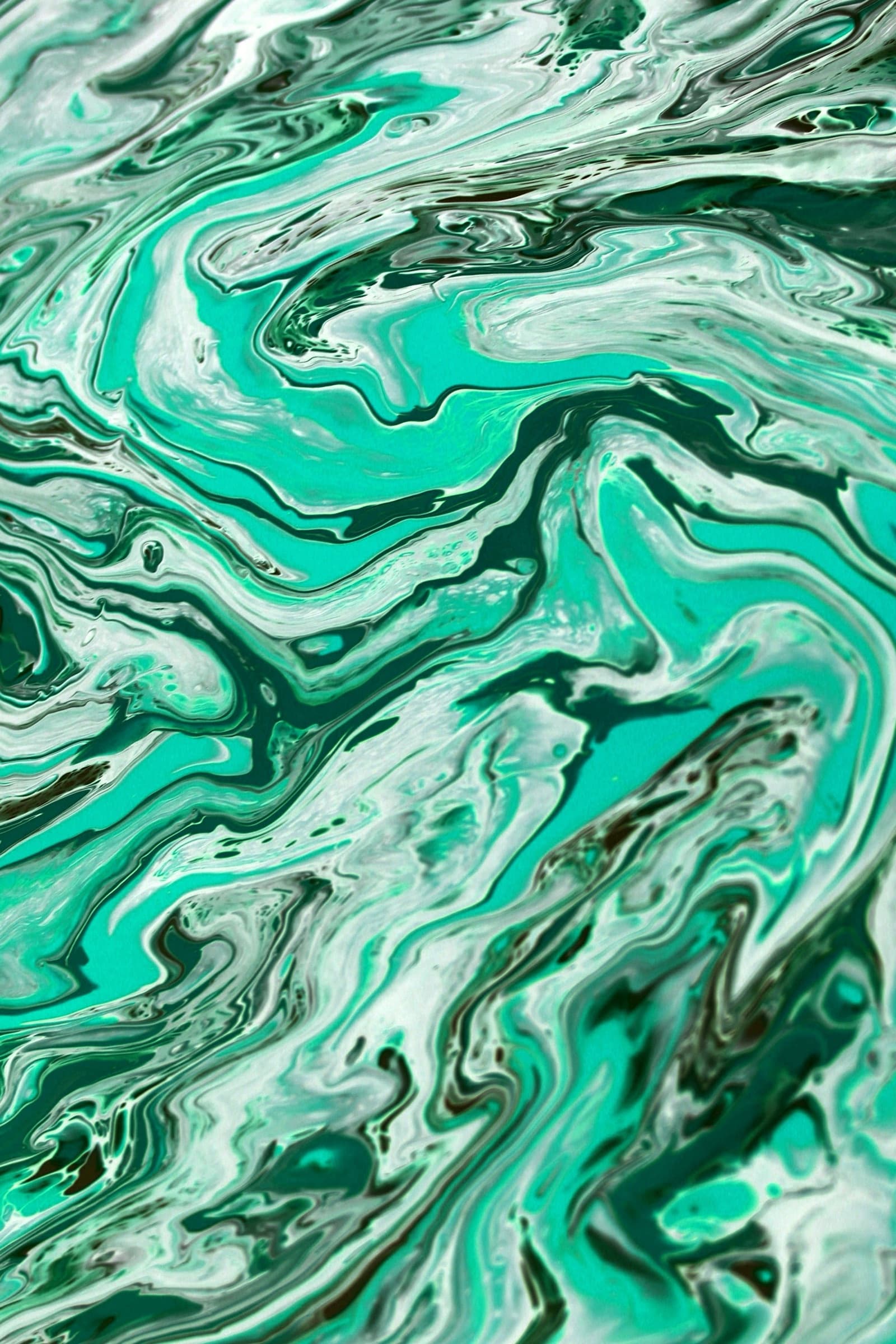 Abstract teal and white natural stone veining