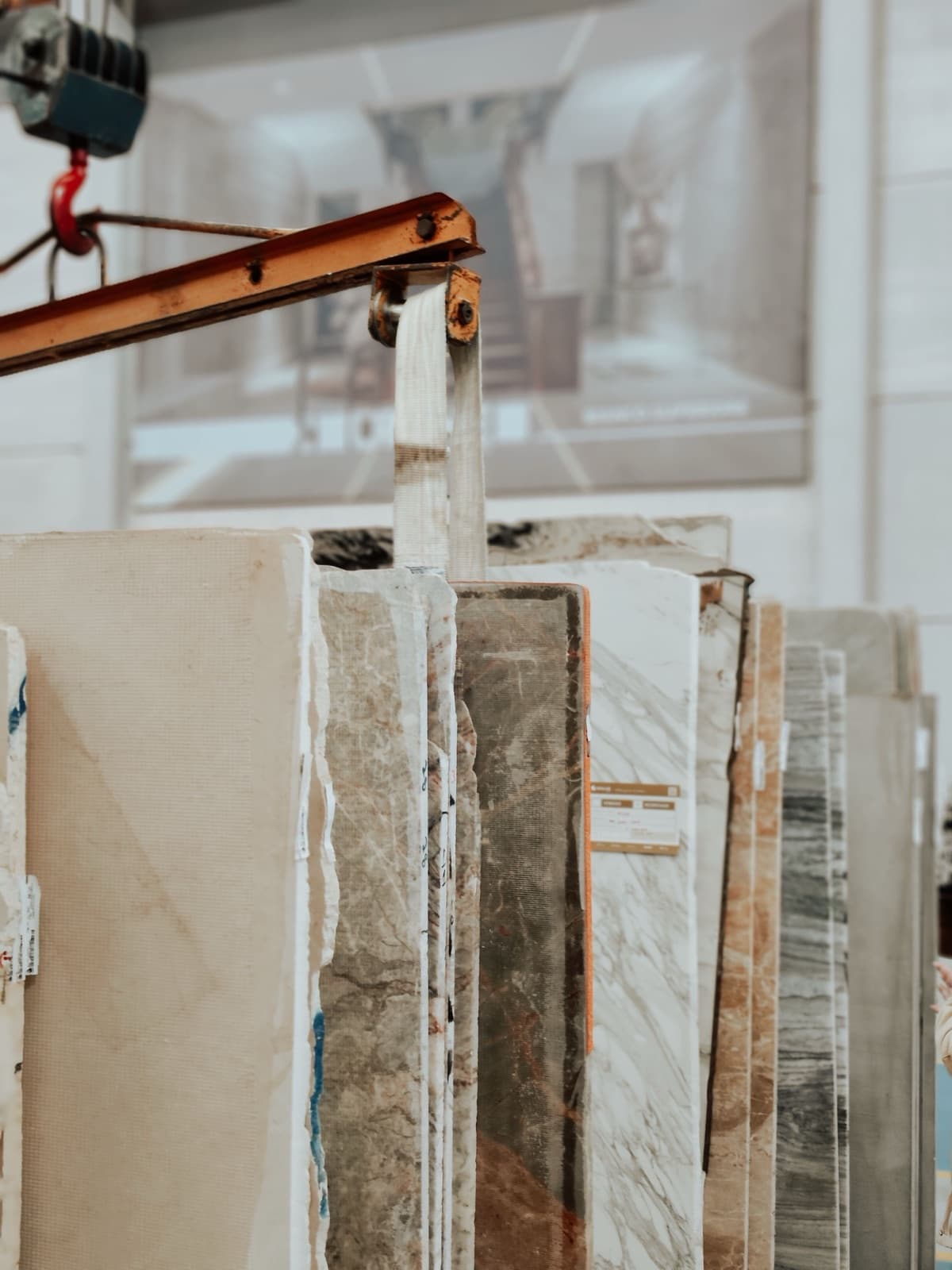 Rows of natural stone slabs stored in the Lapidus Toronto warehouse